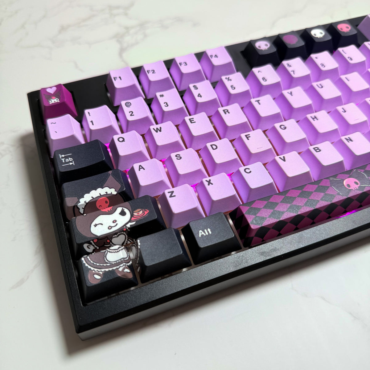 Rebel V2 keyboard top-down view showing dedicated number pad and media controls