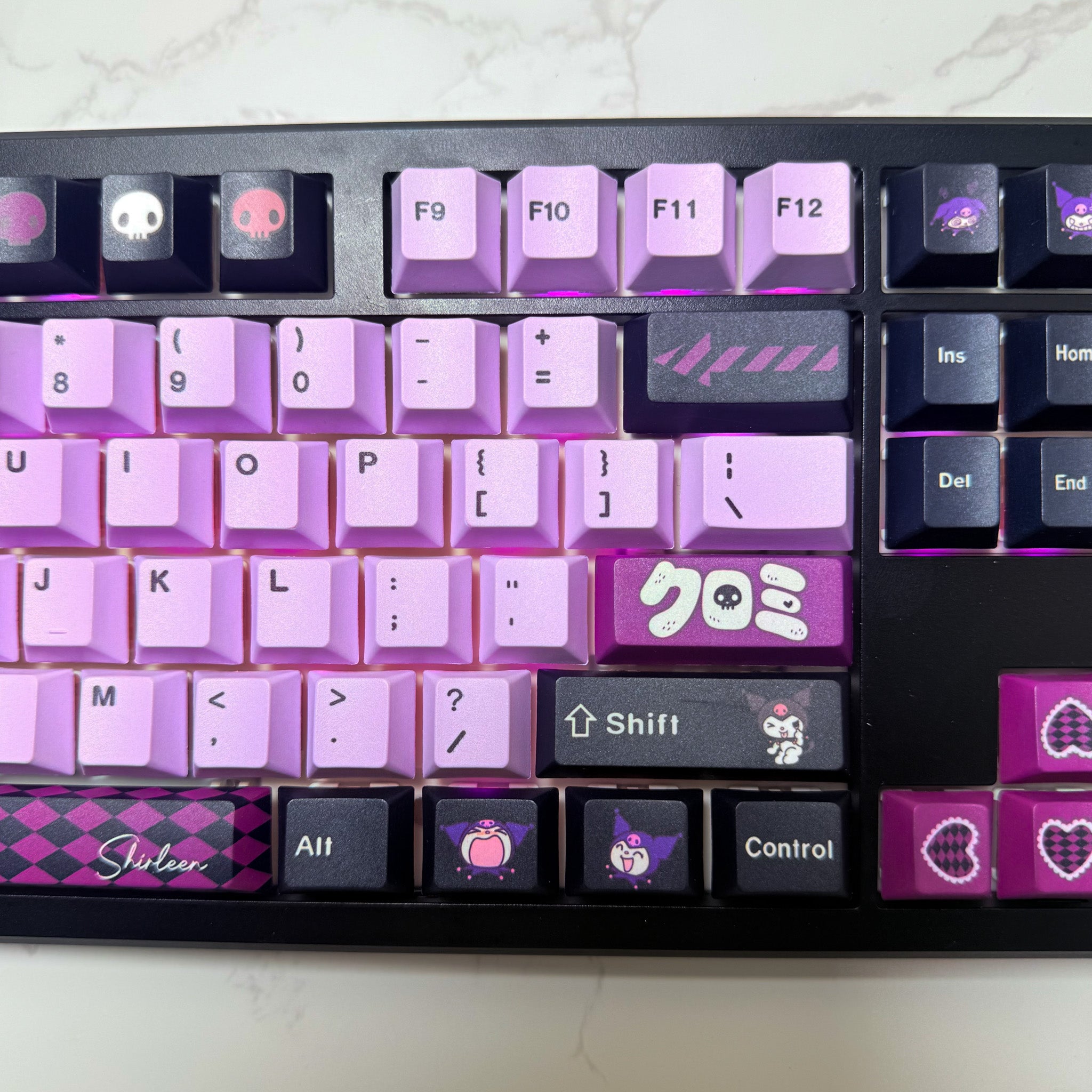 Rebel V2 keyboard close-up of triple-tone keycaps with gothic font