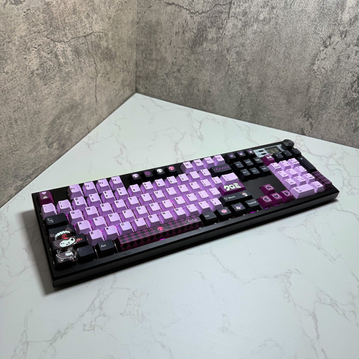 Rebel V2 keyboard with included accessories and packaging